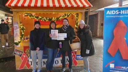 Welt-Aids-Tag 2022: Tombola Hauptgewinn Überreichung